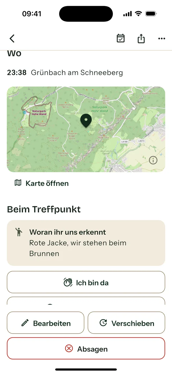 Der Abschnitt „Beim Treffpunkt“ unter einer Karte des Naturparks Hohe Wand: der Hinweis „Woran ihr uns erkennt — Rote Jacke, wir stehen beim Brunnen“ und darunter die Schaltfläche „Ich bin da“.